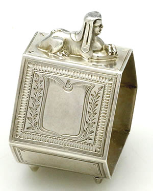 Antique sterling napkin ring hexagonal with applied Egyptian Sphinx